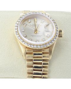 Pre-owned 18K Yellow Gold Rolex 26mm Watch With Diamond Hour Markers and Bezel